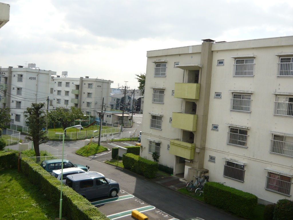 View. The photograph is a view from another dwelling unit.