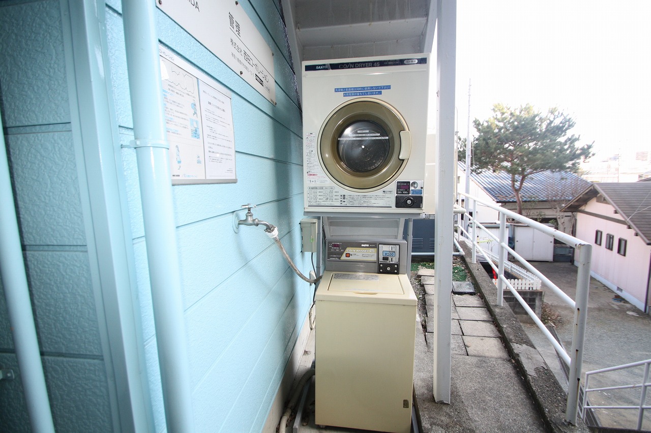 Other common areas. Coin-operated washing machine