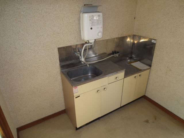 Kitchen. It comes with a water boiler.