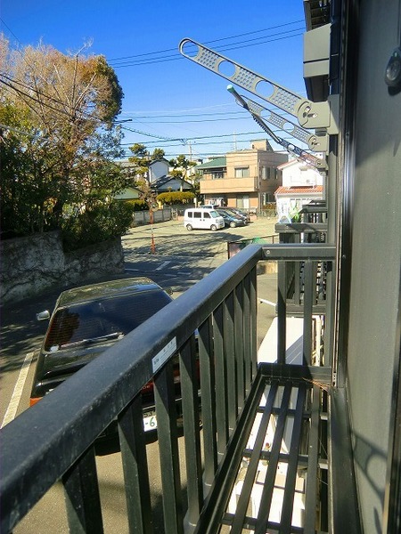 Balcony. There are clear of the neighboring house