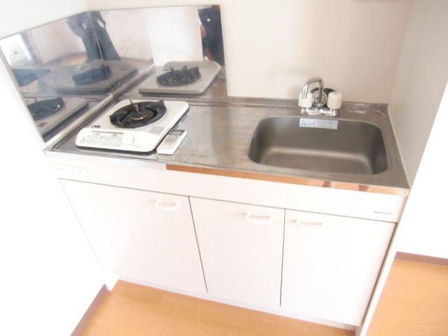 Kitchen. It is with a gas stove