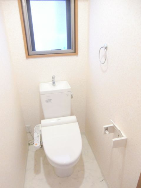 Toilet. It is with window