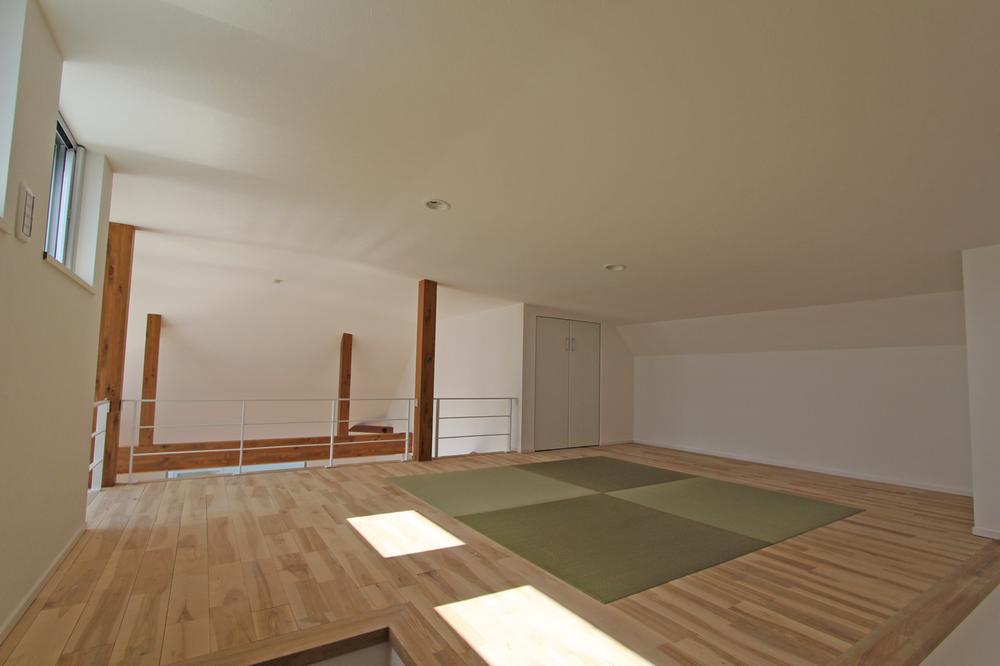 Model house photo. Loft with tatami corner Example of construction