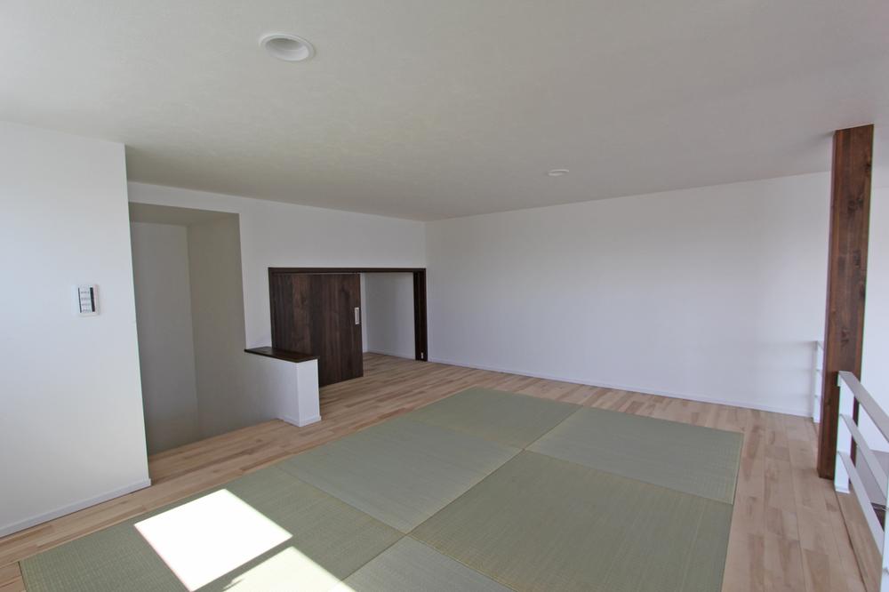 Model house photo. Loft with tatami corner Example of construction