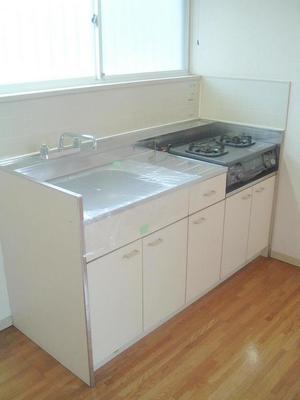 Kitchen. Bright kitchen with a window Gas two-burner installation Allowed