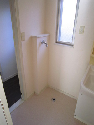 Other Equipment. Washing machine in the room