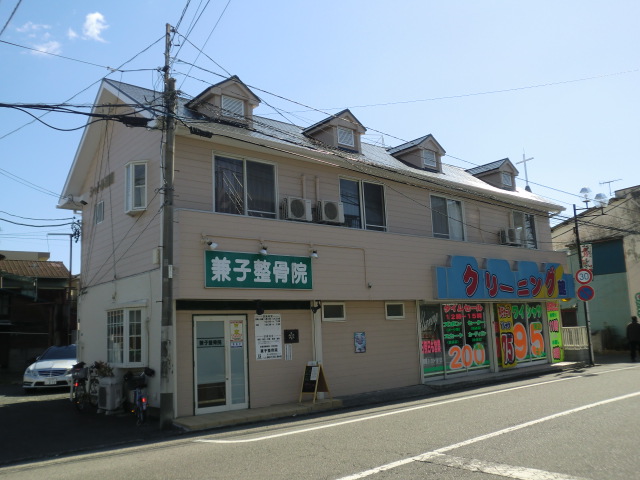 Building appearance. The first floor is the store