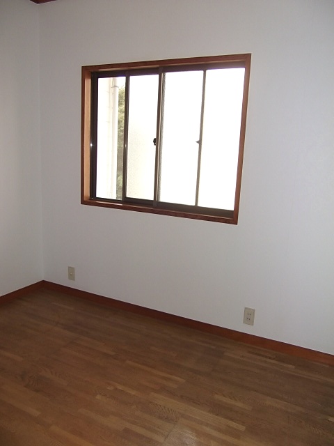 Other room space. There is a window also on the north side of the room!
