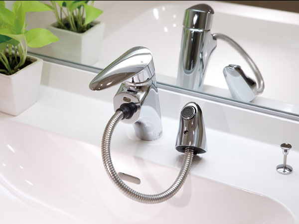 Bathing-wash room. Single lever mixing faucet with pull-out hose