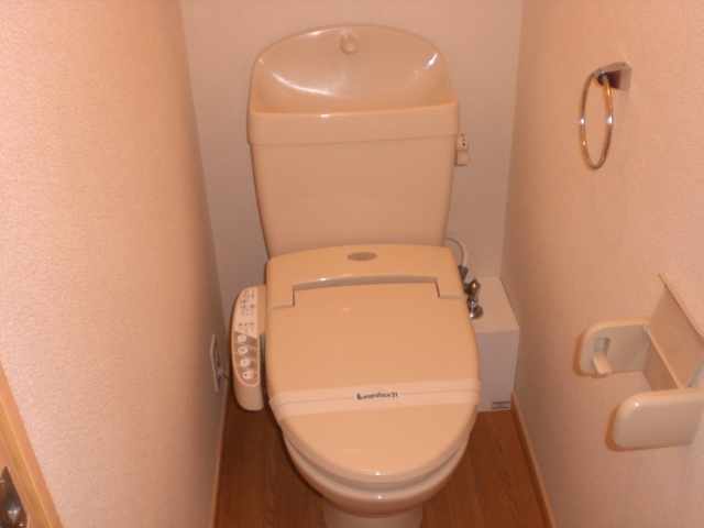 Toilet. It is a warm water washing toilet seat