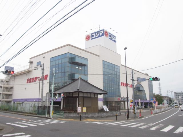 Shopping centre. Kojima until the (shopping center) 2000m