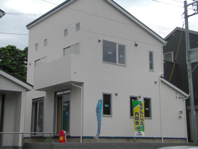 Other. Shooting from the building east side of the road