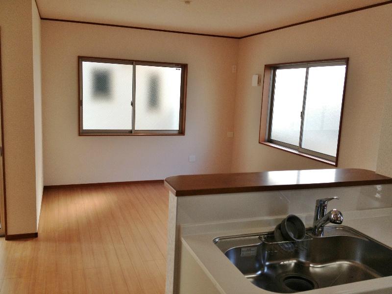 Living. Living room overlooks from the kitchen!