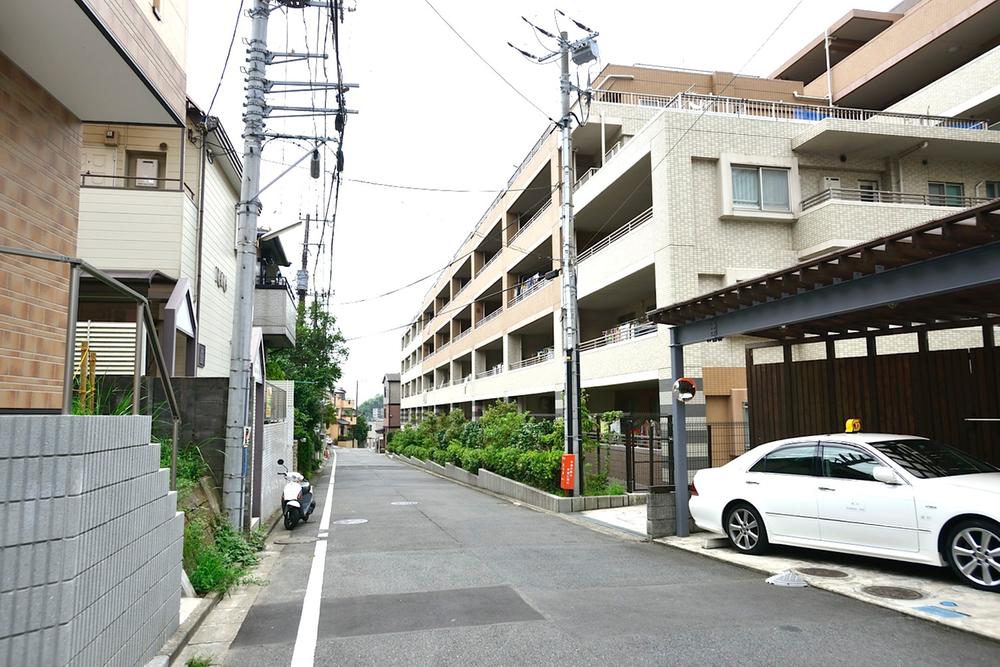 Local photos, including front road. The surroundings are green for many remain a quiet residential area
