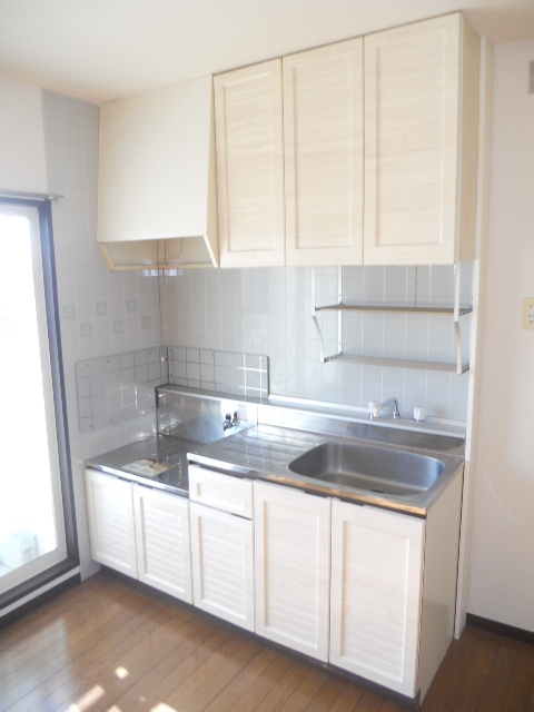 Kitchen. A quiet residential area ・ Corner room ・ Day good