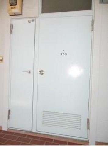 Other room space. It is the entrance door. 
