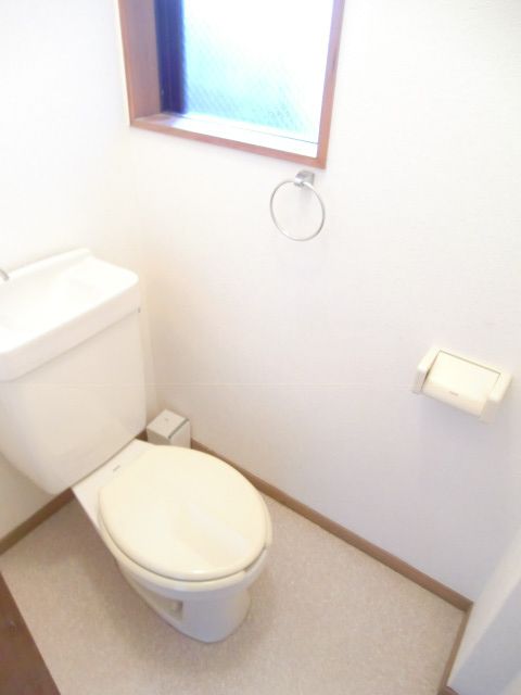 Toilet. It is with window