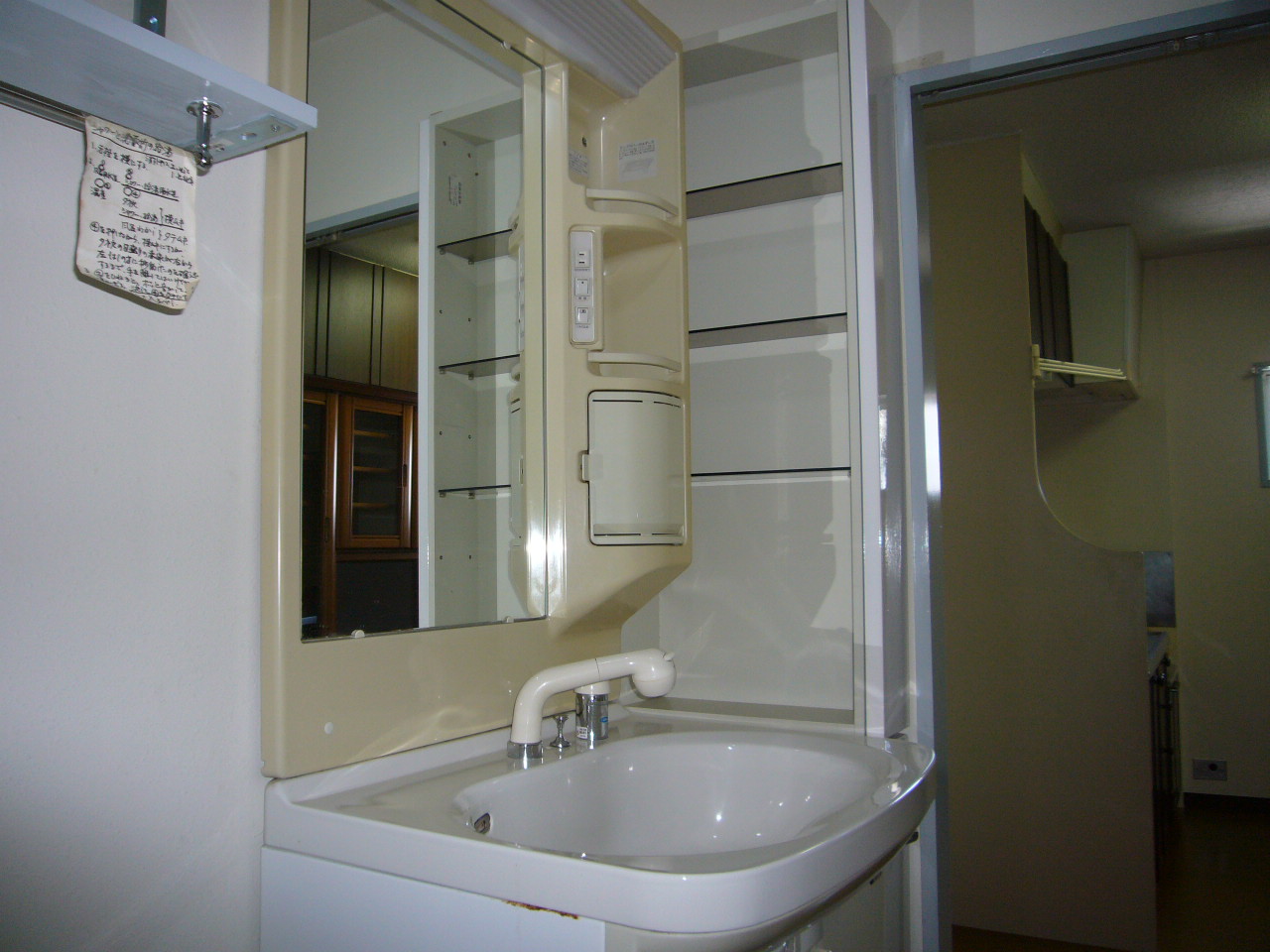 Washroom. Vanity equipped with a shower! ! 