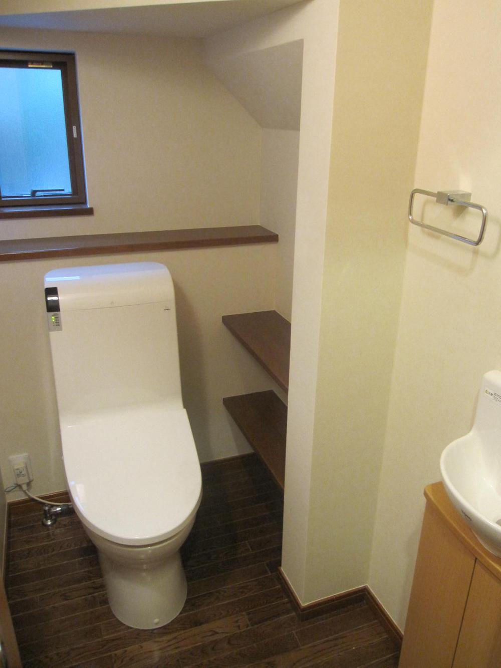 Toilet. First floor toilet. With so windows can be natural ventilation. With hand washing faucet. 