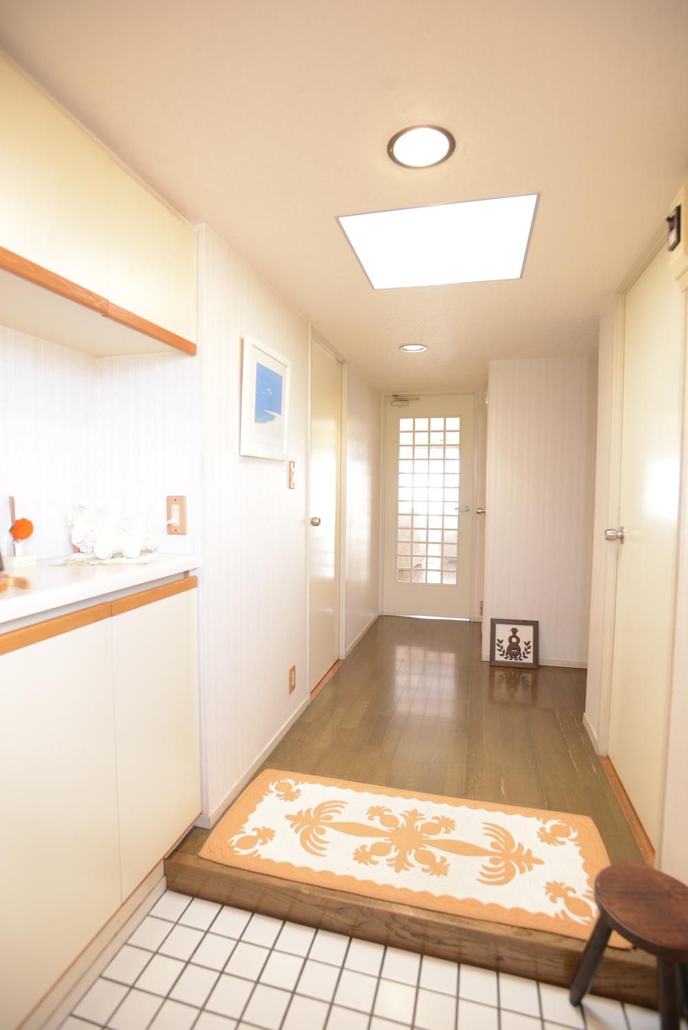 Living. Bright entrance hall with a top light.