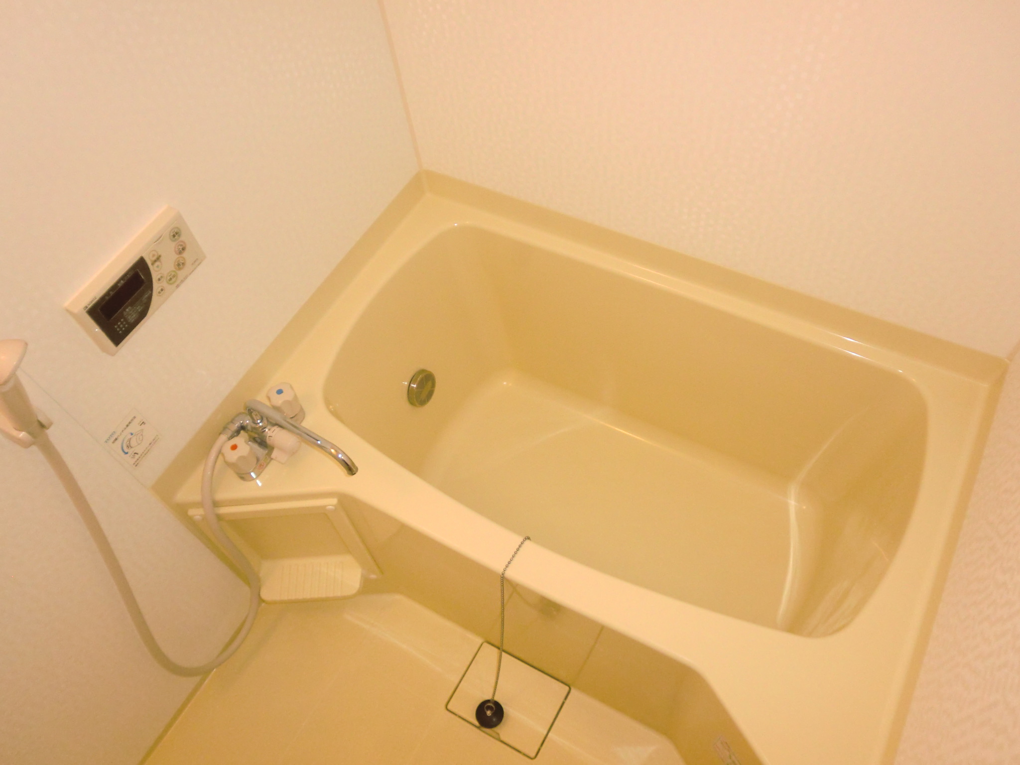 Bath. Tub is equipped with additional heating function