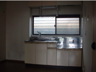 Kitchen. There is a window in the kitchen