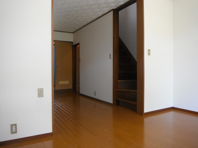 Living and room. Near the stairs that go up to the second floor