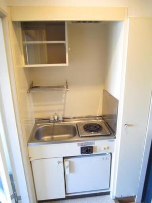 Kitchen. Electric stove ・ Mini fridge with.