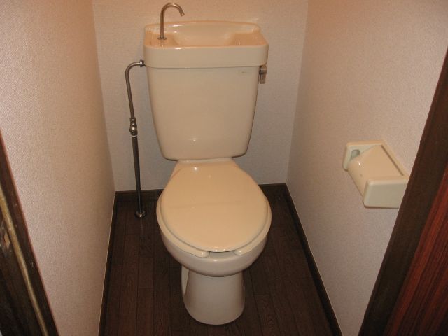 Toilet. Also separate toilet and bath