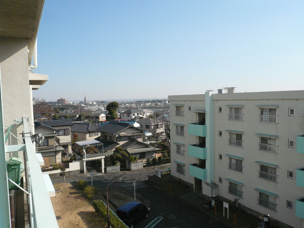 View. The photograph is a view from another dwelling unit.