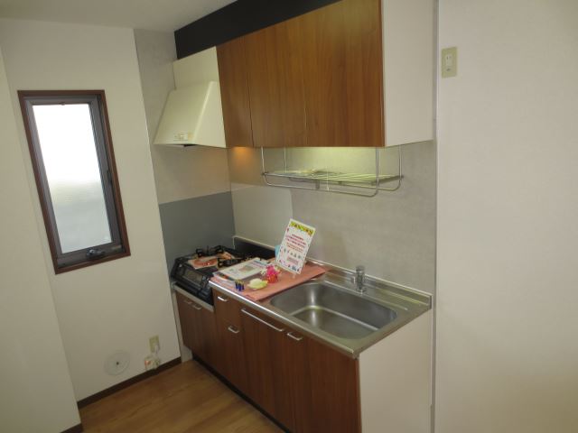 Kitchen. It is bright and there is a window in the kitchen, Ventilation is also good! 