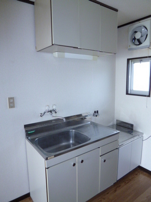 Kitchen. Our size that can be accommodated large pots and pans there kitchen storage