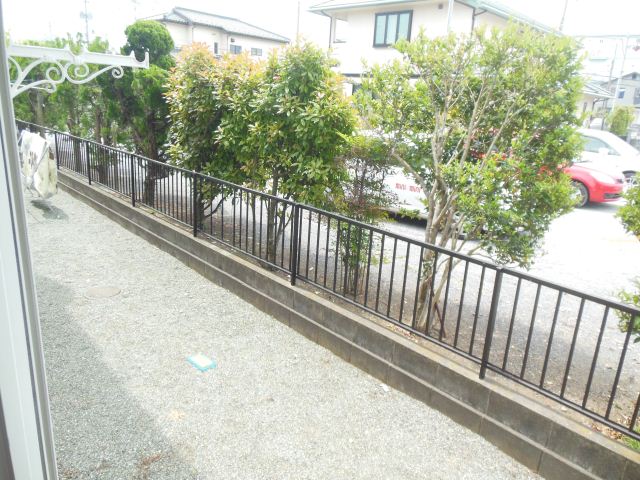 Balcony. There is a little garden.