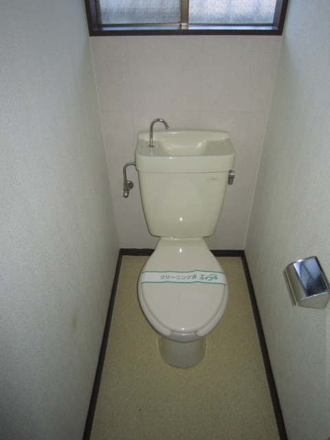 Toilet. The toilet There is also a window. 