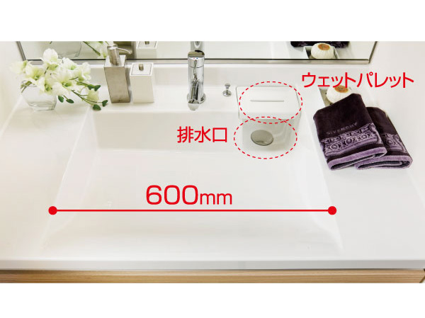 Bathing-wash room.  [Artificial marble LJ counter] It was to be able to use widely the whole basin bowl the location of the drain outlet in the right back. It is with a wet palette wet things put.