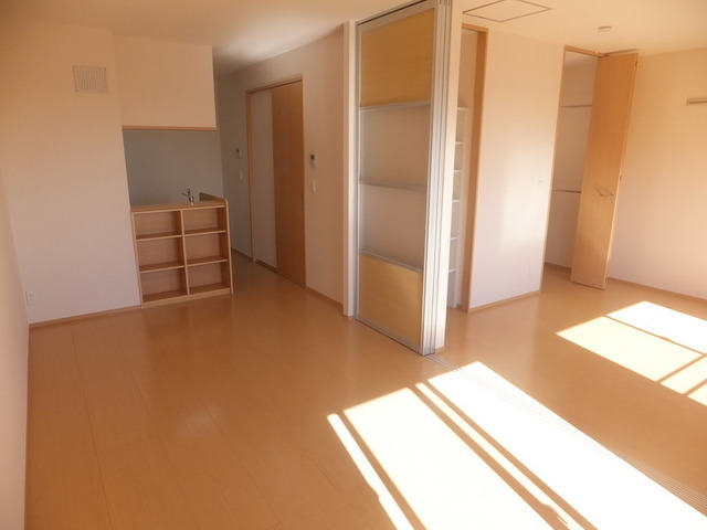 Other room space. There is a feeling of opening because it is counter kitchen