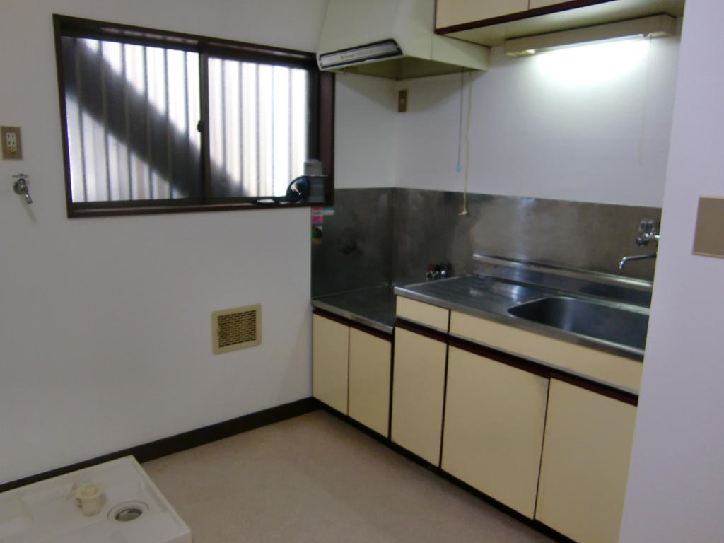 Living and room. Bright sunshine will plug because there is a small window.