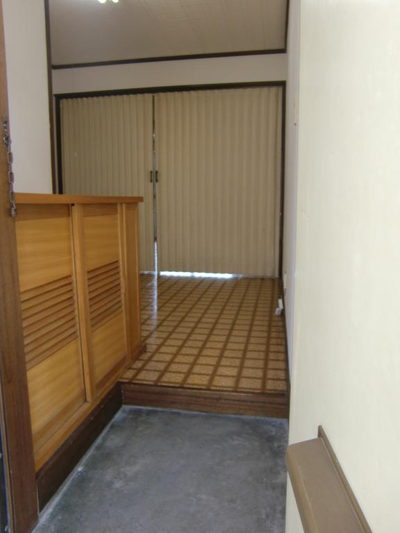 Entrance. Cupboard is attached.