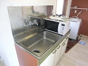 Kitchen. It is sufficient kitchen to living alone. 