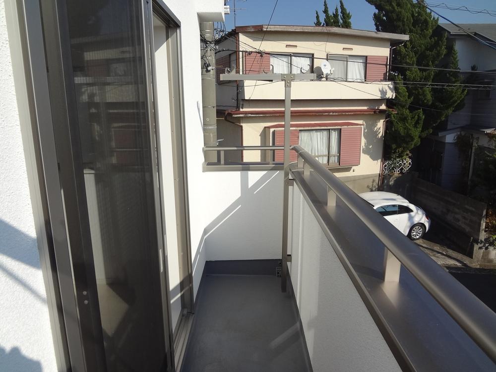 Balcony. Second floor balcony (shooting eastward)