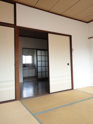 Living and room. Rooms are divided in the flooring and Japanese-style room