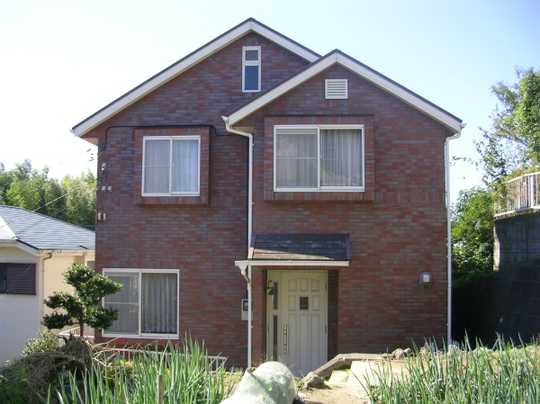 Local appearance photo. appearance The outer wall tiled brick.