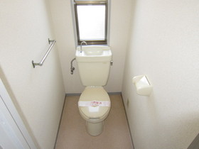 Toilet. Also attaches window in the toilet