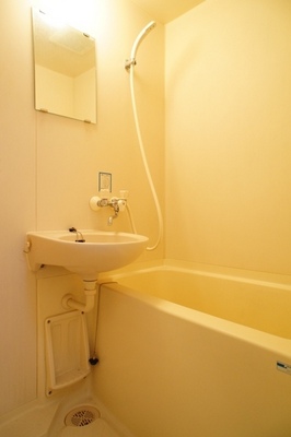 Bath. It is the same room type and wash basin