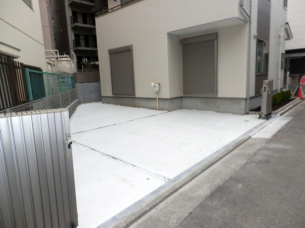 Parking lot. Car space two Allowed! Peace of mind with a sliding gate!