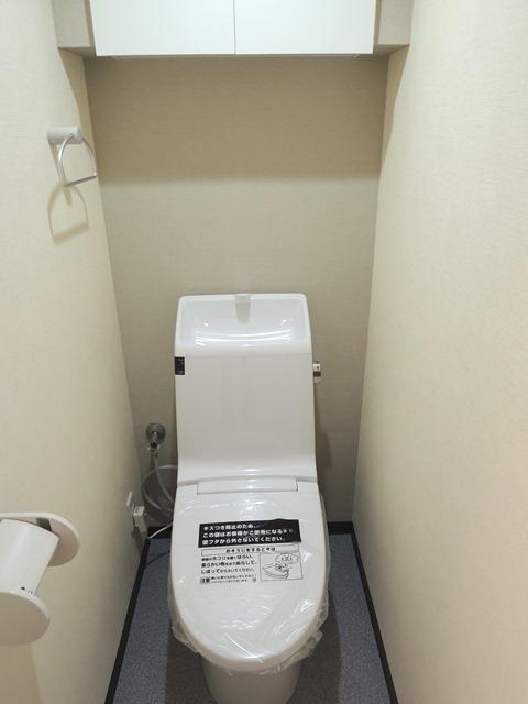 Toilet. It is a bidet wall-mounted remote-control.