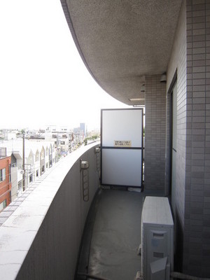 Balcony. It is a photograph of the same type of room.