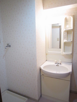 Washroom. It is a photograph of the same type of room.