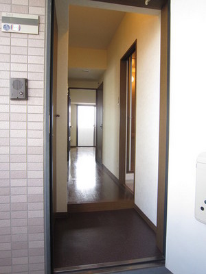 Entrance. It is a photograph of the same type of room.