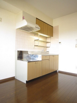 Kitchen. It is a photograph of the same type of room.